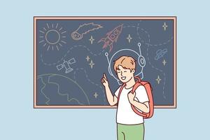 Joyful boy with backpack behind back stands near blackboard depicting universe with spaceships and planets. Schoolboy is fond of astronomy with drawings of UFOs and satellite ships. Flat vector image