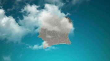 carte du pays de la côte d'ivoire avec zoom avant des nuages réalistes traversent. effet de zoom de la caméra dans le ciel sur la carte de la côte d'ivoire. fond adapté aux introductions d'entreprise, au tourisme, aux présentations. video