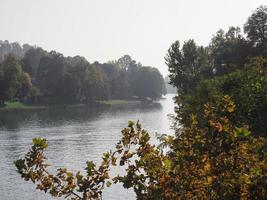 Calm autumn river flowing photo