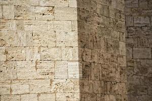 fondo de piedra de la pared de la iglesia de san quirico foto