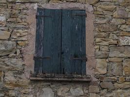 Old frassinedolo medieval village walls in valley around Bismantova stone near castelnovo ne monti photo