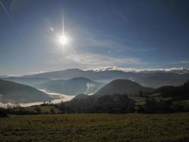 Low clouds like fog in appennines valley around Bismantova stone a rock formation in the Tuscan-Emilian Apennines photo