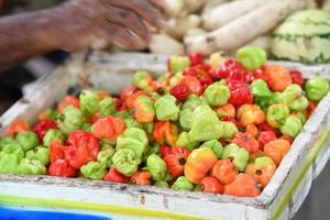 MALE, MALDIVES - MARCH, 4 2017 - People buying fruit and vegatbles photo