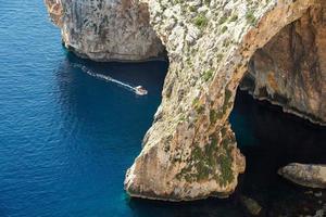 Malta blue grotto arch by the sea aerial photo