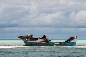 ship wreck on the reef photo