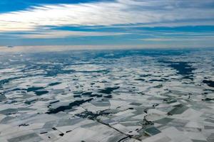 europe france winter farmed fields covered by snow aerial panorama photo