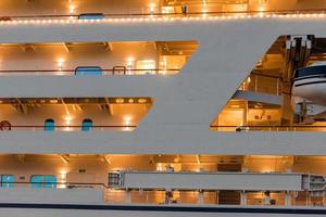 ferry ship lights at night harbor operation photo