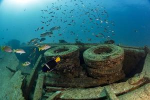 tires Ship Wreck in bali indonesia indian ocean photo