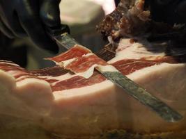cutting spanish iberic cured ham