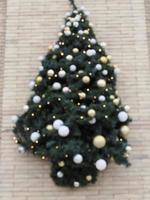 Close up of balls on christmas tree. Bokeh garlands in the background. New Year concept. photo