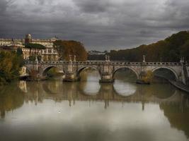 Castel Sant'Angelo and the Sant'Angelo bridge during sunny day in Rome photo