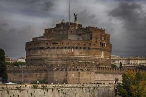 Castel Sant'Angelo and the Sant'Angelo bridge during sunny day in Rome photo