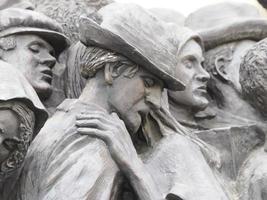 ROME, ITALY - NOVEMBER 25, 2022, migrants monument sculpture in Vatican place St. Peter's Square in Rome photo