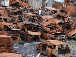 junkyard old rusted car field photo