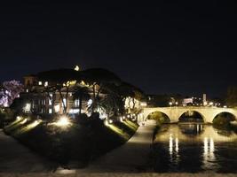 Rome tiberina tiber island view at night photo