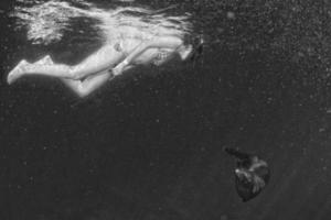 beautiful girl and sea lion underwater photo