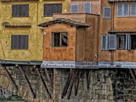 puente ponte vecchio río arno florencia tiendas antiguas foto