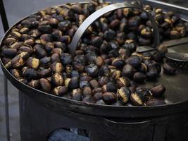 street roasted chestnut in rome road food seller photo