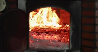 Burning Fire In The Oven For Baking Bread In The Bakery. - medium, slow motion video