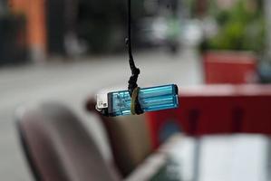 cigarette Lighter hanged on the rope photo