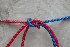 Red and blue rope on a white background photo