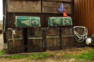 cages on a fishing in stonehaven, Scotland. photo