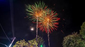 fireworks celebration at night in the temple photo