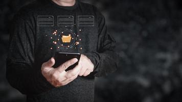 man use smartphone to manage data,Document Management System DMS,knowledge and documentation in enterprise with ERP.online documentation database and process automation to efficiently manage files. photo