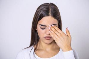 Don't Touch Your Face. Girl rubbing her eye with dirty hands.Precautions, Avoid Touching Your Eyes. Woman rubbing her eye photo