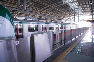 11 January 2023 Dhaka  Bangladesh The Dhaka Metro Mass Rapid Transit MRT High Speed electric train on the platform photo