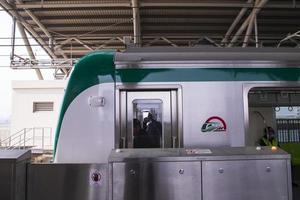 11 January 2023 Dhaka  Bangladesh The Dhaka Metro Mass Rapid Transit MRT High Speed electric train on the platform photo