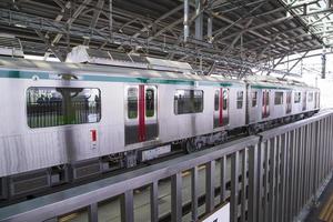 11 January 2023 Dhaka  Bangladesh The Dhaka Metro Mass Rapid Transit MRT High Speed electric train on the platform photo