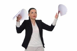 Business woman throwing work papers in the air. Stress from workload. photo