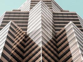 View up a steel and glass building facade photo