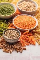 A variety of fusilli pasta from different types of legumes. Gluten-free pasta. photo