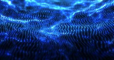 Abstract blue futuristic waves from a grid of particles lines glowing bright shiny neon digital magical energy on a dark background. Abstract background photo