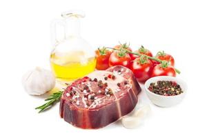 meat steak and cooking ingredients isolated on whtie background. photo