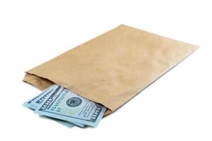 Pile of new design US dollar bills in brown envelope isolated on white background photo