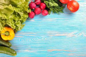 fresh vegetable on wooden background photo