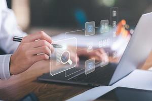 Businessman Audit online documents, quality assessment management With a checklist, business document evaluation process, market data report analysis and consulting, plan review process. photo