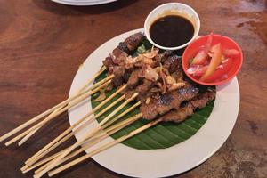 Chicken grilled satay skewers photo