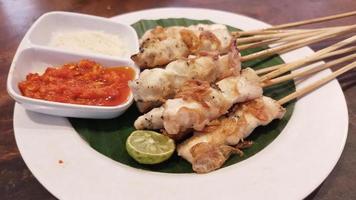 Chicken grilled satay skewers photo