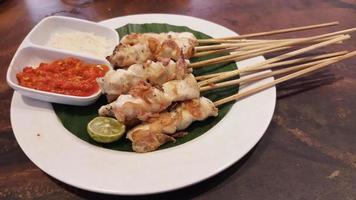 Chicken grilled satay skewers photo