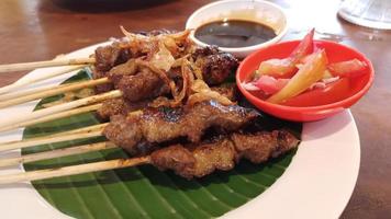 Chicken grilled satay skewers photo