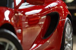 detail close up of a red sports car photo