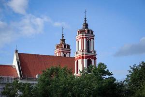 Church of St. Philip and St. Jacob is a Roman Catholic church in Vilnius' Old Town side view on blue sky background photo