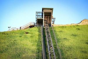 Funicular to Gediminas tower in Vilnius on bright summer day in Lithuania on blue sky background photo