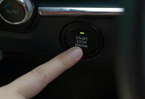 Push Start button is a push button that acts like a car key. It is used to turn on and off the system inside the car and start the engine without the need for a key to turn the starter. photo