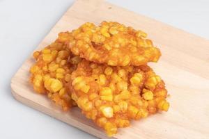 Corn Fritters on white background photo