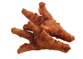 pies de pollo frito sobre un fondo blanco foto